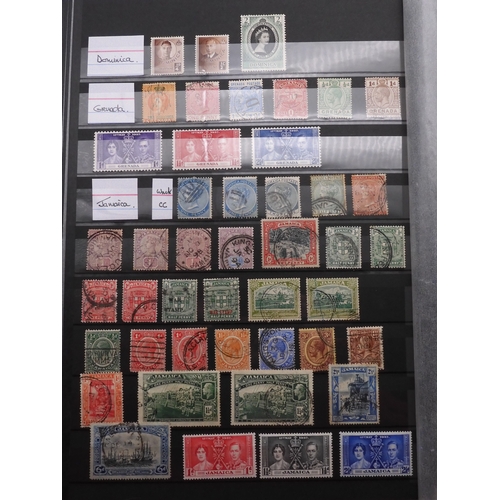 7060 - British Commonwealth Collection in Two Lighthouse Stock Books. with most countries in Dark Blue Stoc... 
