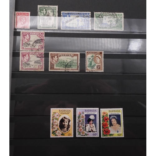 7060 - British Commonwealth Collection in Two Lighthouse Stock Books. with most countries in Dark Blue Stoc... 