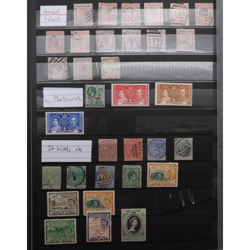 7060 - British Commonwealth Collection in Two Lighthouse Stock Books. with most countries in Dark Blue Stoc... 