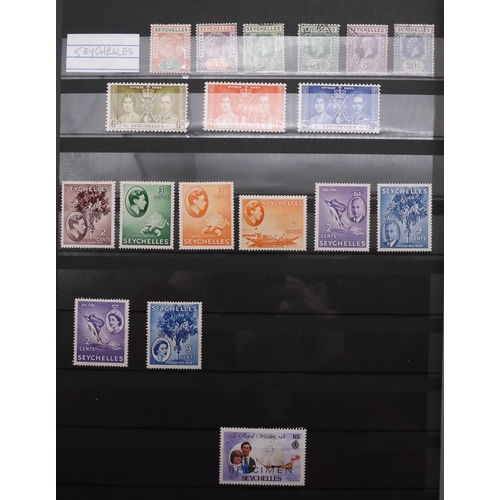 7060 - British Commonwealth Collection in Two Lighthouse Stock Books. with most countries in Dark Blue Stoc... 