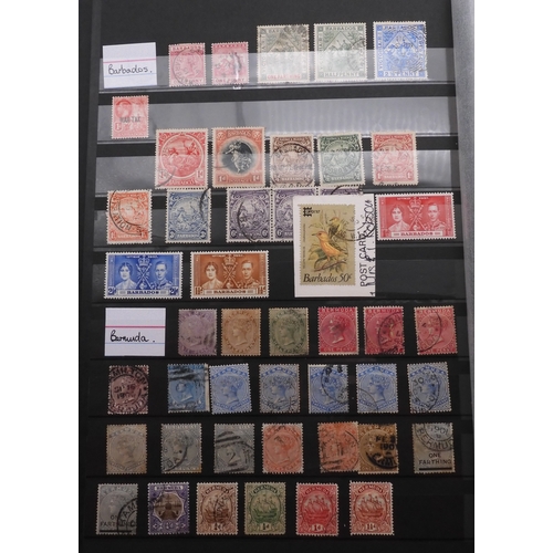 7060 - British Commonwealth Collection in Two Lighthouse Stock Books. with most countries in Dark Blue Stoc... 