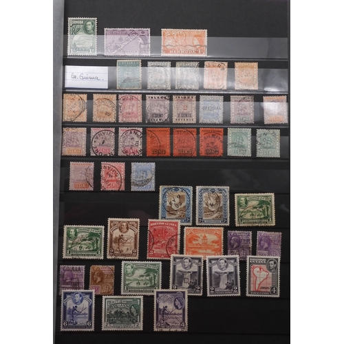 7060 - British Commonwealth Collection in Two Lighthouse Stock Books. with most countries in Dark Blue Stoc... 