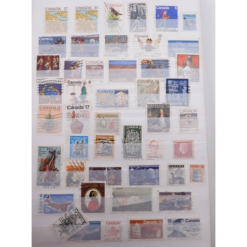 7060 - British Commonwealth Collection in Two Lighthouse Stock Books. with most countries in Dark Blue Stoc... 