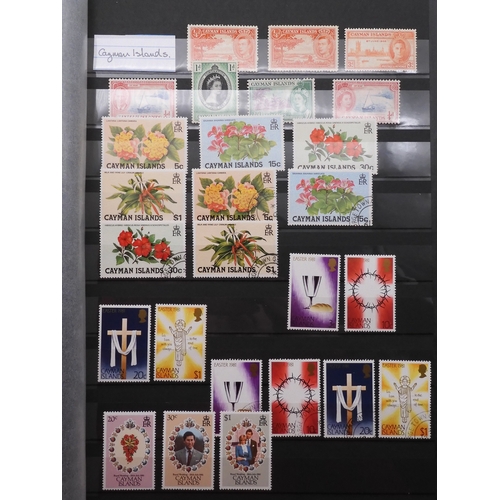 7060 - British Commonwealth Collection in Two Lighthouse Stock Books. with most countries in Dark Blue Stoc... 