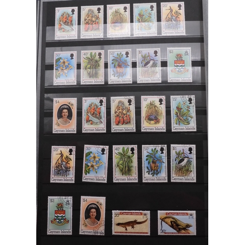 7060 - British Commonwealth Collection in Two Lighthouse Stock Books. with most countries in Dark Blue Stoc... 