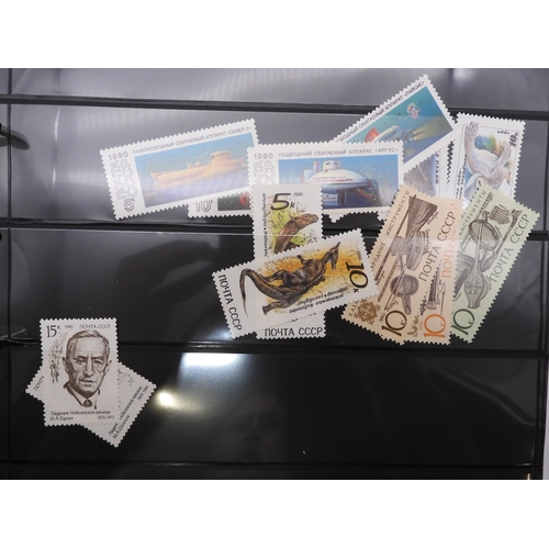 7069 - Russia From 1990 in Two Albums and a large Quantity of lose U/M stamps and Miniature Sheets on stock... 