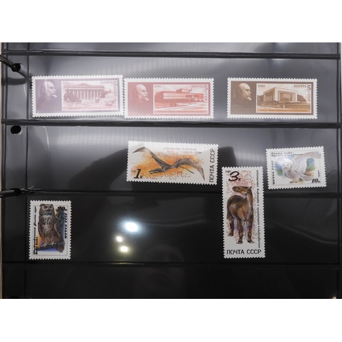 7069 - Russia From 1990 in Two Albums and a large Quantity of lose U/M stamps and Miniature Sheets on stock... 