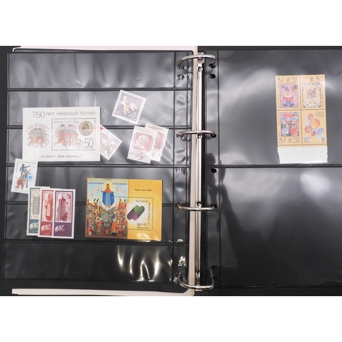 7069 - Russia From 1990 in Two Albums and a large Quantity of lose U/M stamps and Miniature Sheets on stock... 
