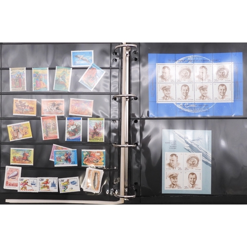 7069 - Russia From 1990 in Two Albums and a large Quantity of lose U/M stamps and Miniature Sheets on stock... 