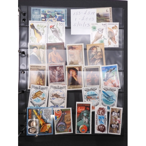 7069 - Russia From 1990 in Two Albums and a large Quantity of lose U/M stamps and Miniature Sheets on stock... 