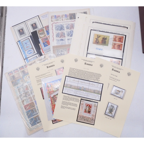 7069 - Russia From 1990 in Two Albums and a large Quantity of lose U/M stamps and Miniature Sheets on stock... 