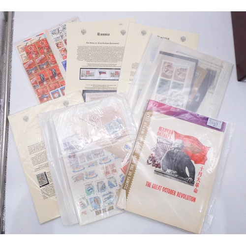 7069 - Russia From 1990 in Two Albums and a large Quantity of lose U/M stamps and Miniature Sheets on stock... 