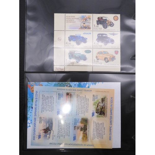 7069 - Russia From 1990 in Two Albums and a large Quantity of lose U/M stamps and Miniature Sheets on stock... 