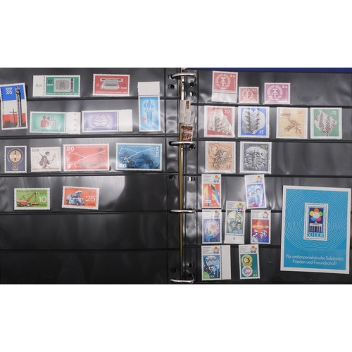 7089 - A collection of German and East German stamps in an album