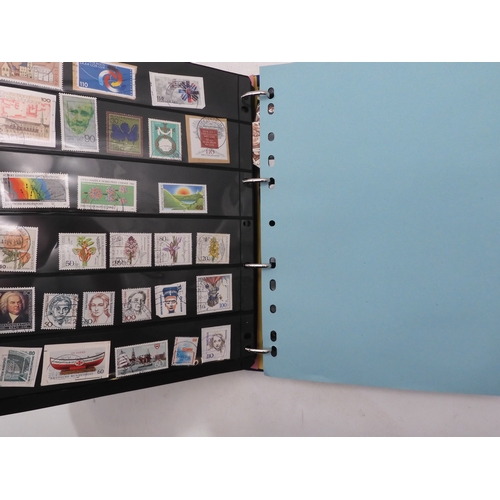 7089 - A collection of German and East German stamps in an album
