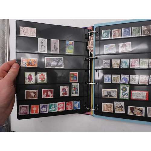 7089 - A collection of German and East German stamps in an album
