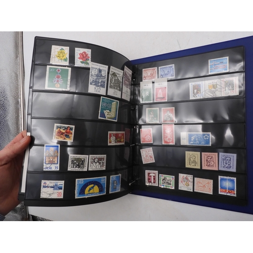 7089 - A collection of German and East German stamps in an album
