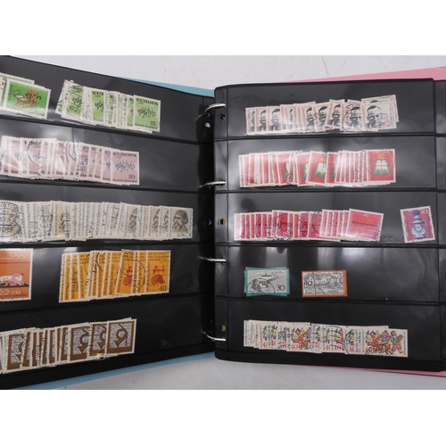 7089 - A collection of German and East German stamps in an album