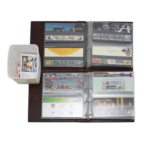 7091 - Great Britain two albums containing Royal Mint  Booklets together with Royal Mail stamp books, Chris... 