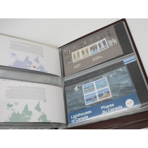 7091 - Great Britain two albums containing Royal Mint  Booklets together with Royal Mail stamp books, Chris... 