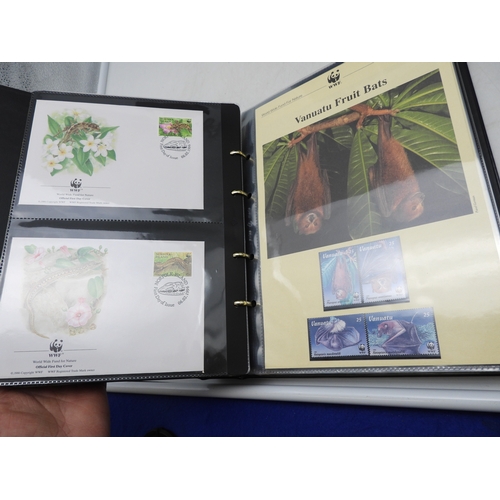 7098 - World Wildlife Fund For Nature in four albums with both first day covers and unmounted mint stamps (... 
