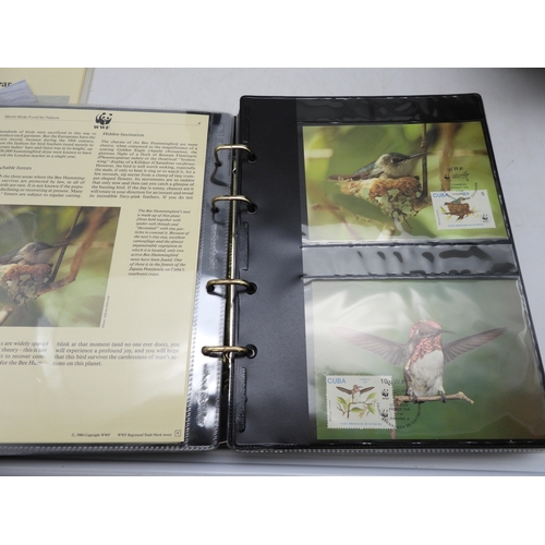 7098 - World Wildlife Fund For Nature in four albums with both first day covers and unmounted mint stamps (... 
