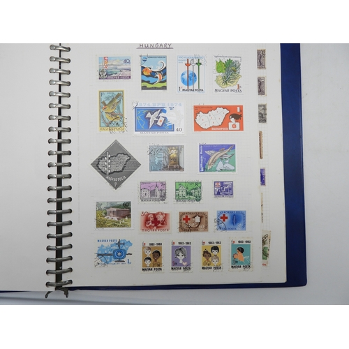 7099 - A worldwide stamp collection in seven albums