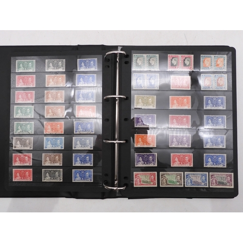 7085 - World Collection in Large 4 ring binder with Hagner Pages. Contains Many Stamps, both mint or used. ... 