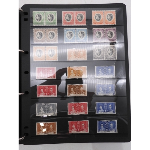 7085 - World Collection in Large 4 ring binder with Hagner Pages. Contains Many Stamps, both mint or used. ... 