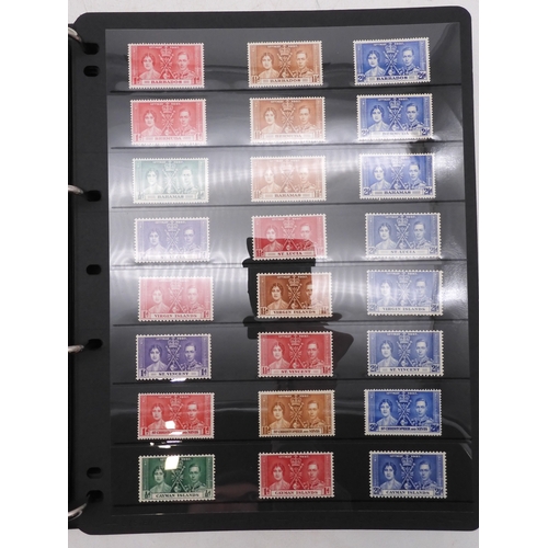 7085 - World Collection in Large 4 ring binder with Hagner Pages. Contains Many Stamps, both mint or used. ... 