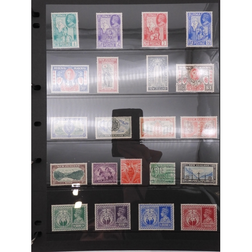 7085 - World Collection in Large 4 ring binder with Hagner Pages. Contains Many Stamps, both mint or used. ... 