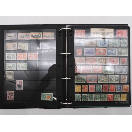 7085 - World Collection in Large 4 ring binder with Hagner Pages. Contains Many Stamps, both mint or used. ... 