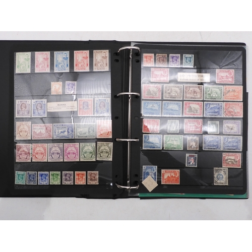 7085 - World Collection in Large 4 ring binder with Hagner Pages. Contains Many Stamps, both mint or used. ... 