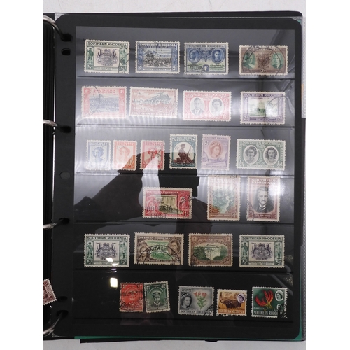 7085 - World Collection in Large 4 ring binder with Hagner Pages. Contains Many Stamps, both mint or used. ... 