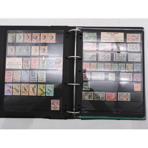 7085 - World Collection in Large 4 ring binder with Hagner Pages. Contains Many Stamps, both mint or used. ... 
