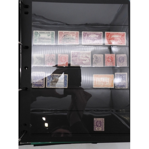 7085 - World Collection in Large 4 ring binder with Hagner Pages. Contains Many Stamps, both mint or used. ... 