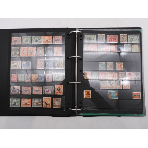 7085 - World Collection in Large 4 ring binder with Hagner Pages. Contains Many Stamps, both mint or used. ... 