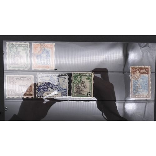 7085 - World Collection in Large 4 ring binder with Hagner Pages. Contains Many Stamps, both mint or used. ... 