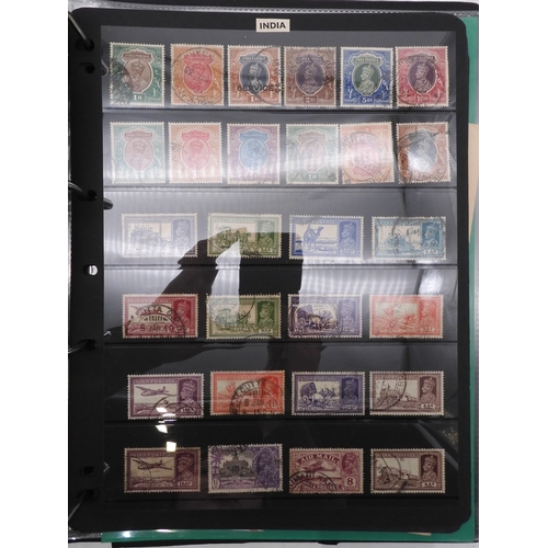 7085 - World Collection in Large 4 ring binder with Hagner Pages. Contains Many Stamps, both mint or used. ... 