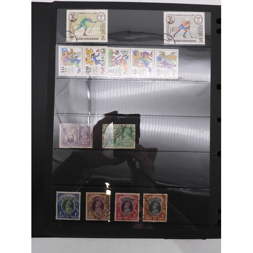 7085 - World Collection in Large 4 ring binder with Hagner Pages. Contains Many Stamps, both mint or used. ... 