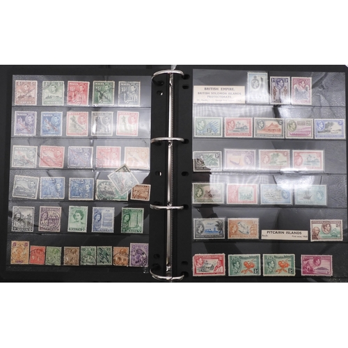 7085 - World Collection in Large 4 ring binder with Hagner Pages. Contains Many Stamps, both mint or used. ... 