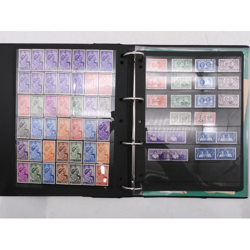 7085 - World Collection in Large 4 ring binder with Hagner Pages. Contains Many Stamps, both mint or used. ... 