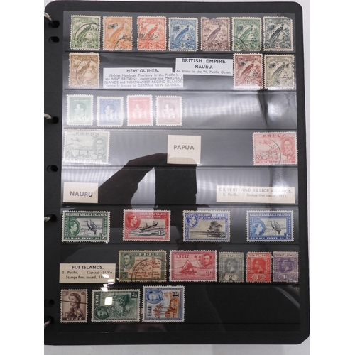 7085 - World Collection in Large 4 ring binder with Hagner Pages. Contains Many Stamps, both mint or used. ... 