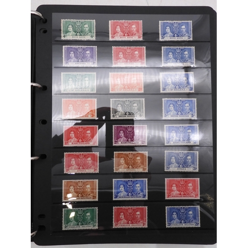7085 - World Collection in Large 4 ring binder with Hagner Pages. Contains Many Stamps, both mint or used. ... 