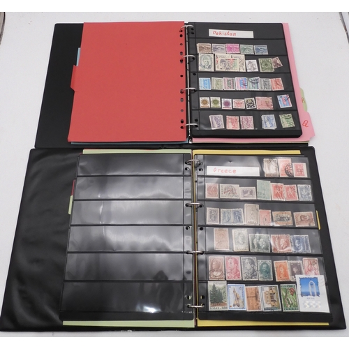 7087 - A world collection of stamps in eight folders and two stock books, all periods, some mint, not check... 