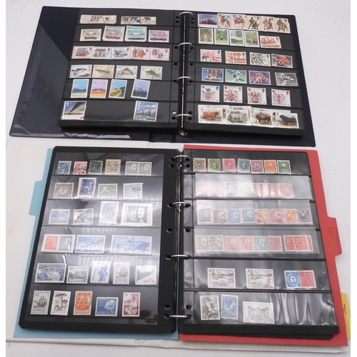 7087 - A world collection of stamps in eight folders and two stock books, all periods, some mint, not check... 