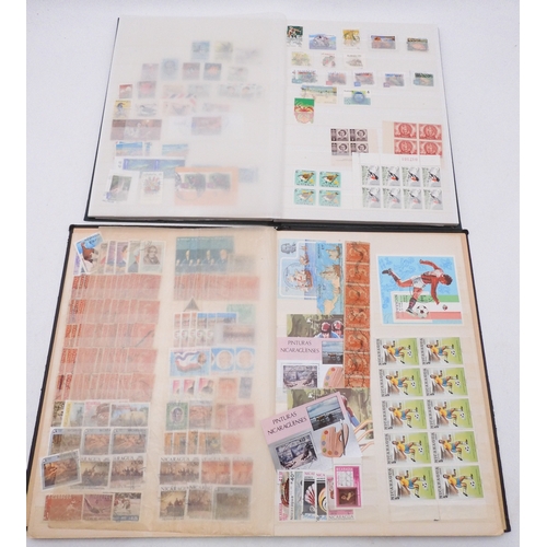 7087 - A world collection of stamps in eight folders and two stock books, all periods, some mint, not check... 