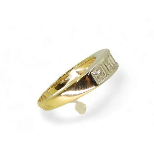 2739 - A PRINCESS CUT DIAMOND RINGthe mount in yellow and white 18ct gold, is set with four princess cut di... 