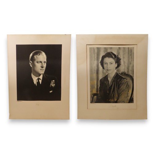 2555 - QUEEN ELIZABETH II AND PRINCE PHILIP, DUKE OF EDINBURGHA pair of portrait photographs by Baron (Ster... 