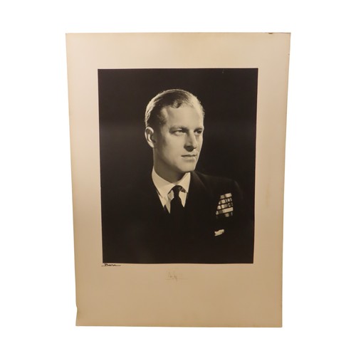 2555 - QUEEN ELIZABETH II AND PRINCE PHILIP, DUKE OF EDINBURGHA pair of portrait photographs by Baron (Ster... 
